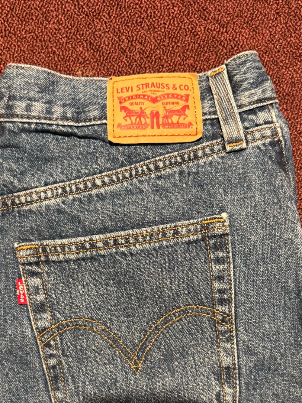 Levi's Women’s Blue Denim Mom Jeans - Classic Back Pocket Design